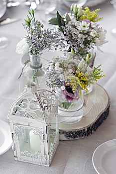 Flowers arrangement and decoration rustic interior design in wedding table