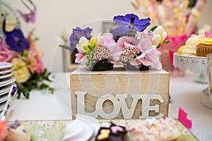 Flowers arrangement. Table setting. Love