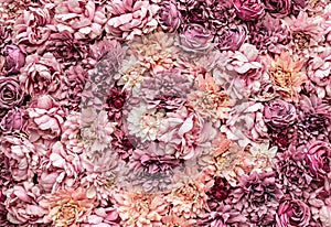 Flowers as background. Pink artificial flowers