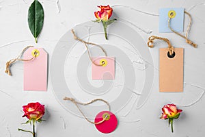 Flowers and blank paper tag. Sending flowers