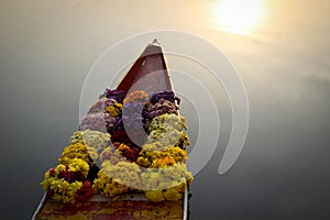 Flowers on boat at floating market