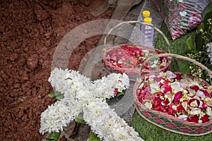 Flowers bouquet lying on the grave