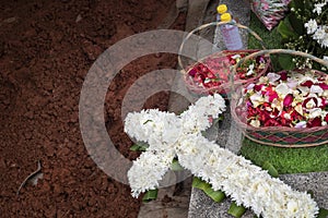 Flowers bouquet lying on the grave