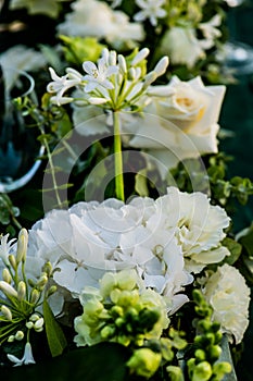 Flowers. Candles. Sunset. Wedding decoration. Floral arrangements