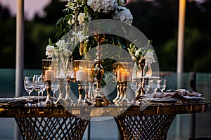 Flowers. Candles. Sunset. Wedding decoration. Floral arrangements