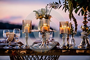 Flowers. Candles. Sunset. Wedding decoration. Floral arrangements