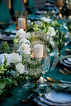 Flowers. Candles. Wedding decoration. Floral arrangements