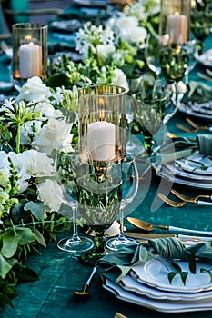 Flowers. Candles. Wedding decoration. Floral arrangements