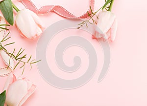 Flowers composition. Frame made of pink flowers on white background. Valentine's Day. Flat lay, top view.