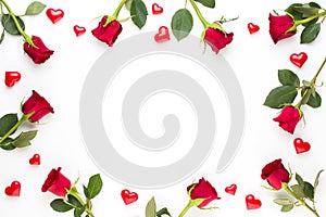 Flowers composition. Frame made of red rose on white background. Flat lay, top view, copy space