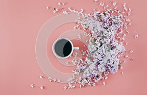 Flowers cup coffee pink background Minimal floral Flat lay top view