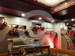 Flowers decoration inside indian wedding banquet hall during evening time in Delhi India