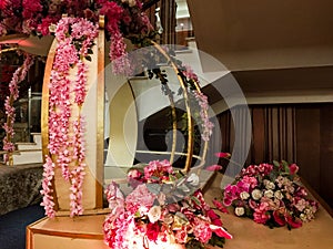 Flowers decoration inside indian wedding banquet hall during evening time in Delhi India