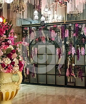 Flowers decoration inside indian wedding banquet hall during evening time in Delhi India