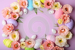 Flowers and Easter eggs on a colored background close-up. Easter background