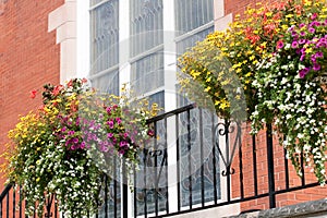 Flowers in front of church stained glass