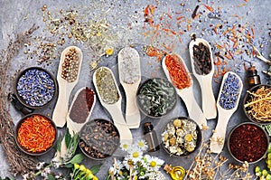 Flowers and herbs for alternative medicine, healthcare background