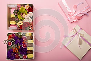 Flowers and macaroons in a hat-box