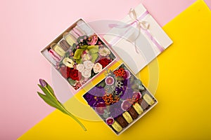 Flowers and macaroons in a hat-box