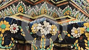 Flowers Made Of Multi Color Ceramic Tiles Decorated On Old Pagoda