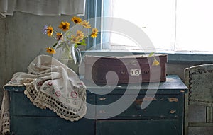 Flowers and old suitcase