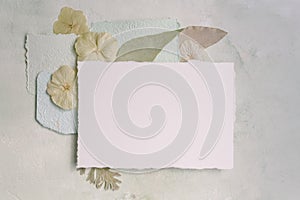 Flowers and paper for lettr, card mockup photo