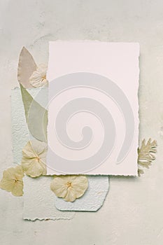 Flowers and paper for lettr, card mockup photo