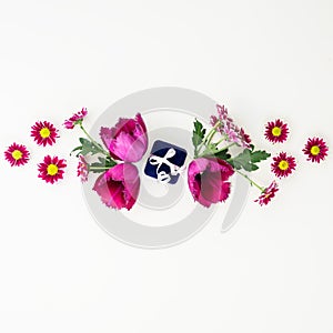 Flowers and ring box isolated on white background. Flat lay, Top view