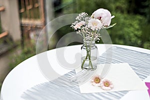 Flowers settings decoration outdoor setup for wedding with pink colored flower