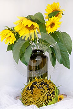 Flowers sunflowers in a vase on a wooden table ripe sunflower, w