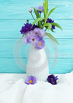 Flowers vase elegance retro chrysanthemum bell on a wooden