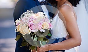 Flowers, wedding or marriage with a bride and groom outdoor together after a ceremony of tradition or celebration