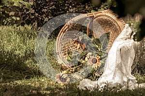 Flowers and a wicker chair fell from a gust of wind.