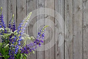 Flowers on the wooden background