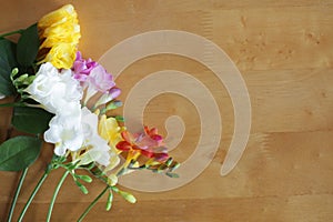 Flowers on the wooden table