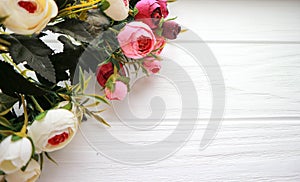 Flowers on a wooden white background in spring