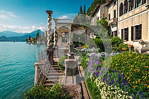 Flowery ornamental garden of villa Monastero with lake Como, Italy