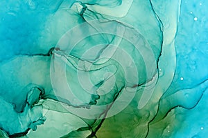 Flowing alcohol ink abstract background. Azure, sapphire colored texture.