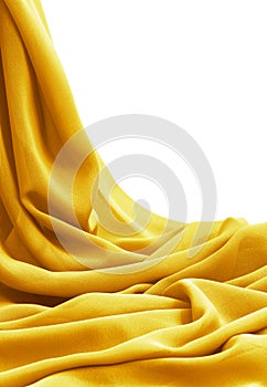 Flowing drape soft golden fabric, isolated on white