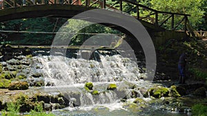 Flowing water Stream under Vrelo Bosne Bridge at outskirts of Sarajevo