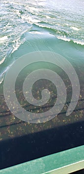 Flowing water under a wobbly bridge