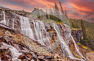 Flowing Waterfall at Lake O`Hara Sunrise in the Canadian Rockies of Yoho National Park