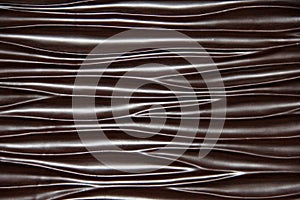 Flowing waves of Chocolate Brown wood texture background
