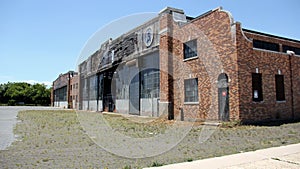 Floyd Bennet Field, shabby exterior with Art Deco elements of abandoned hangar, New York, NY, USA