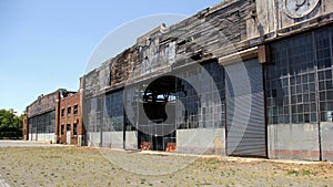 Floyd Bennet Field, shabby exterior with Art Deco elements of abandoned hangar, New York, NY, USA