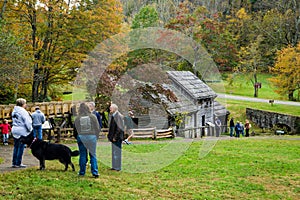 An Autumn View of Visitors at Mabry Mill on the Blue Ridge Parkway