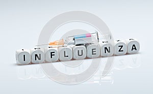 Flu vaccination, syringe on cube