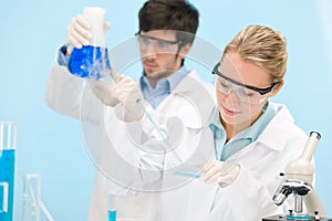 Flu virus experiment - scientist in laboratory