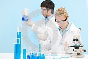 Flu virus experiment - scientist in laboratory