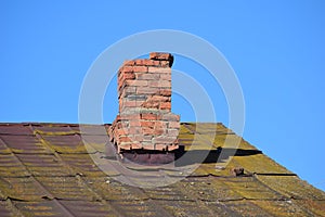 A flue is on an old roof